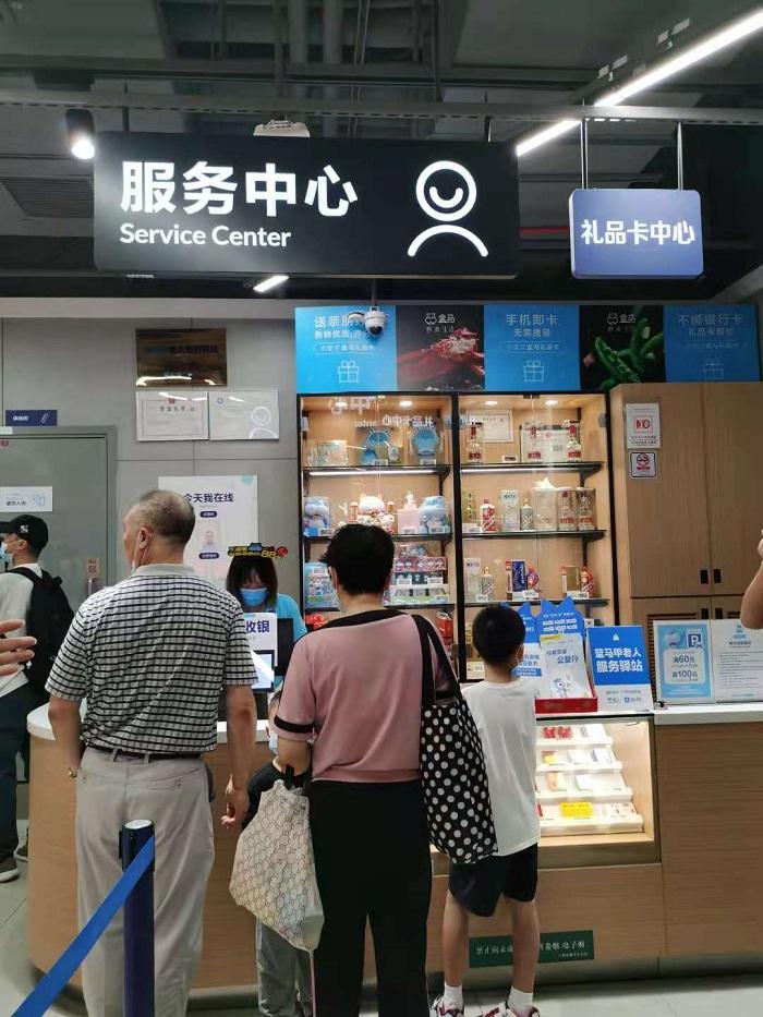 破解老年人手机使用难问题广州年内将建超100个蓝马甲老人服务驿站